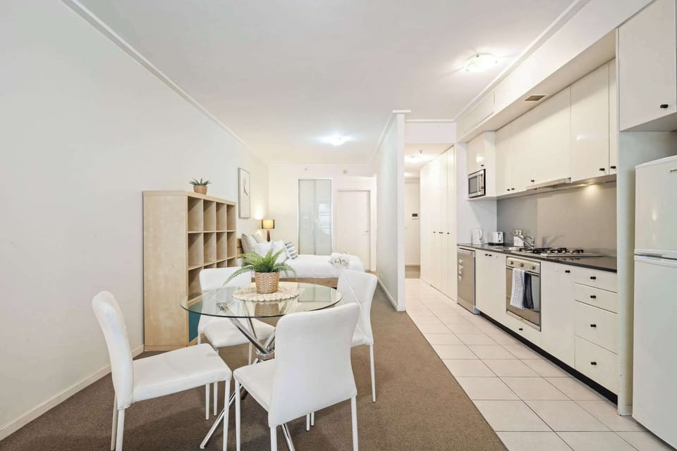 A fully equipped dining & kitchen area