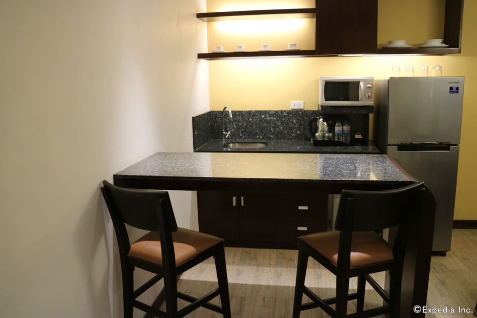 Suite, 1 King Bed, Non Smoking | Private kitchenette | Fridge, coffee/tea maker