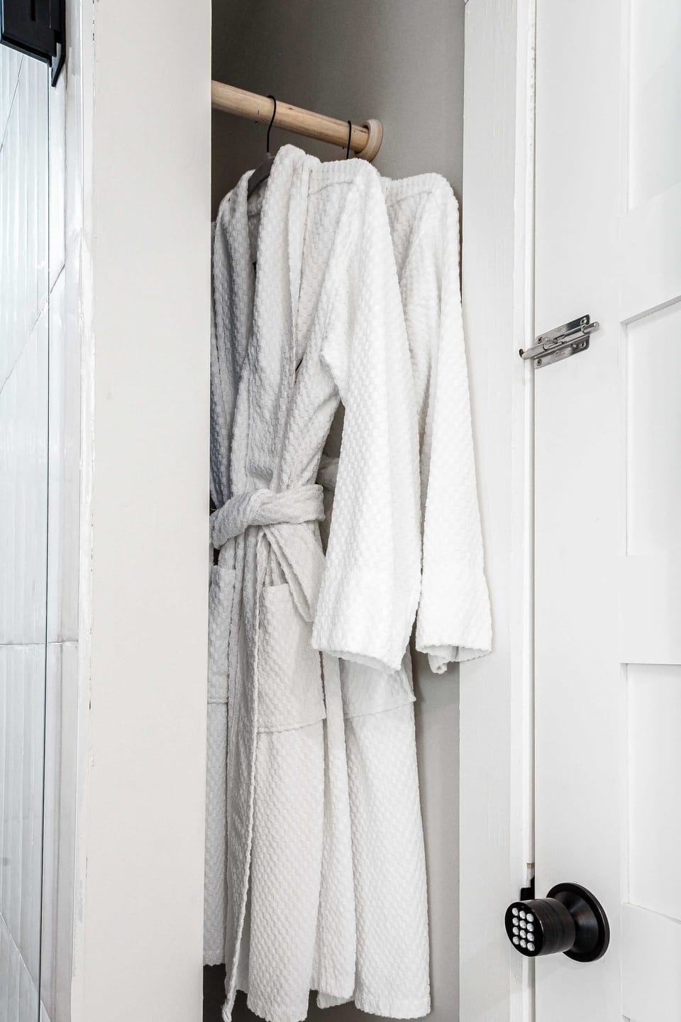 Custom plush robes are provided for a luxurious experience.