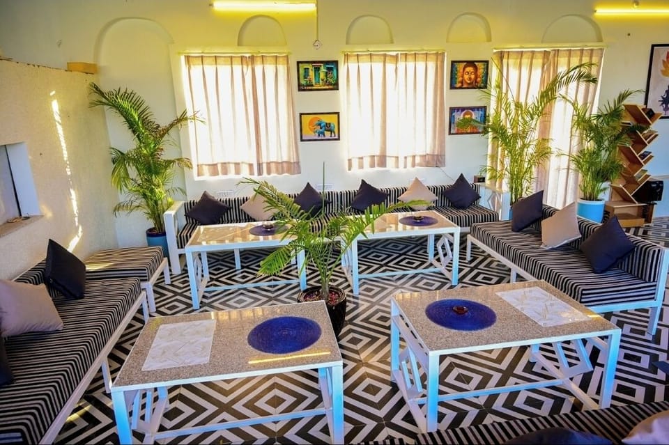 Luxury Double Room, Mountain View | Living area | 32-inch Smart TV with digital channels