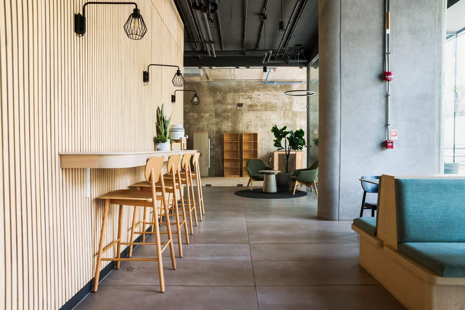 Relax in this stylish lounge area with modern seating and chic decor, perfect for unwinding or socializing.