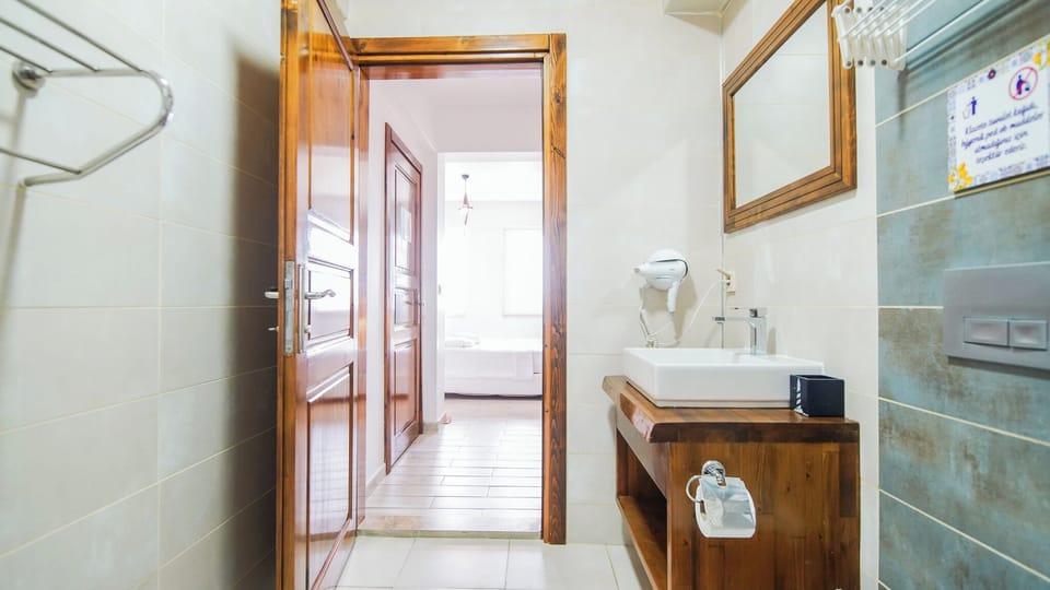 Comfort Double Room, Garden View | Bathroom | Shower, hair dryer, towels, soap