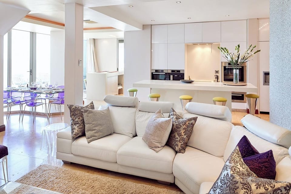 Luxury Penthouse, Sea View | Living area | 32-inch flat-screen TV with satellite channels