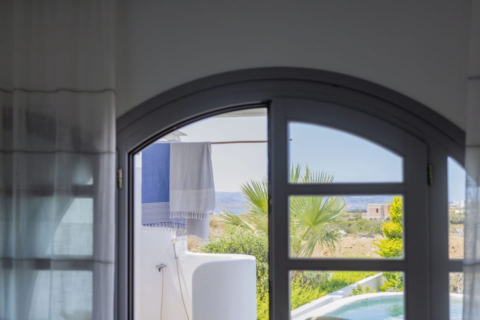 Outdoor shower and pool view