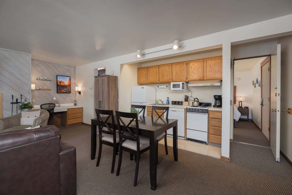 The open kitchen offers ample storage & every home comfort