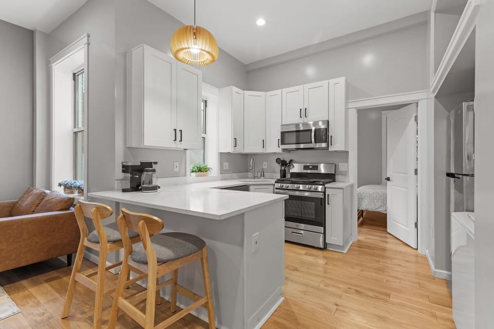 Fully equipped kitchen with cookware, tableware and basic condiments