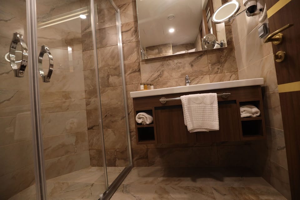 Shower, hair dryer, slippers, soap