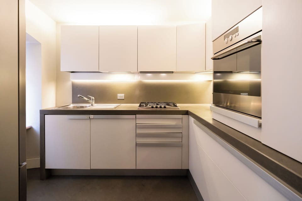 Family Apartment, City View | Private kitchen | Full-size fridge, microwave, oven, stovetop