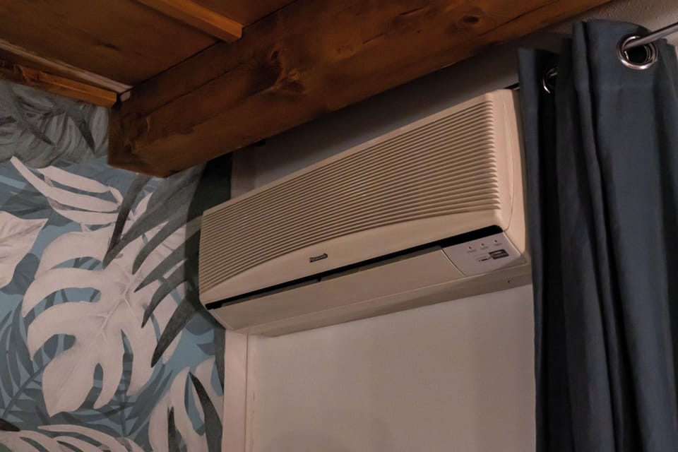 Family Apartment, City View | Air conditioning