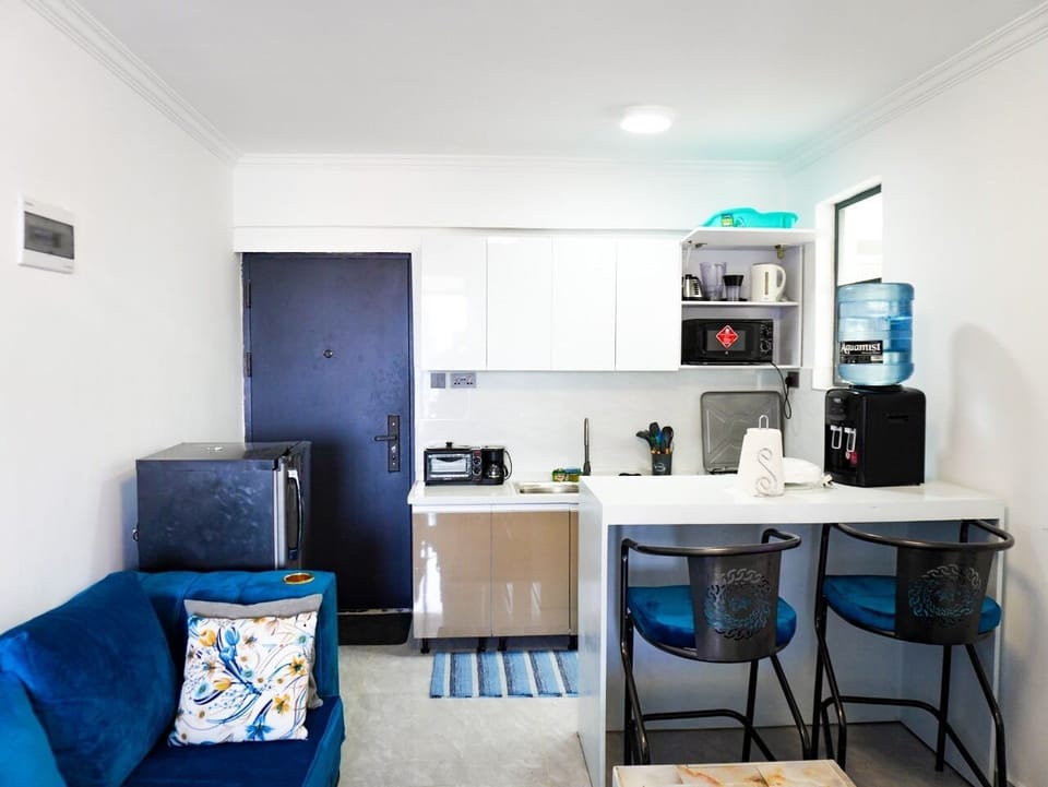Deluxe Apartment | Living area | 32-inch Smart TV with digital channels
