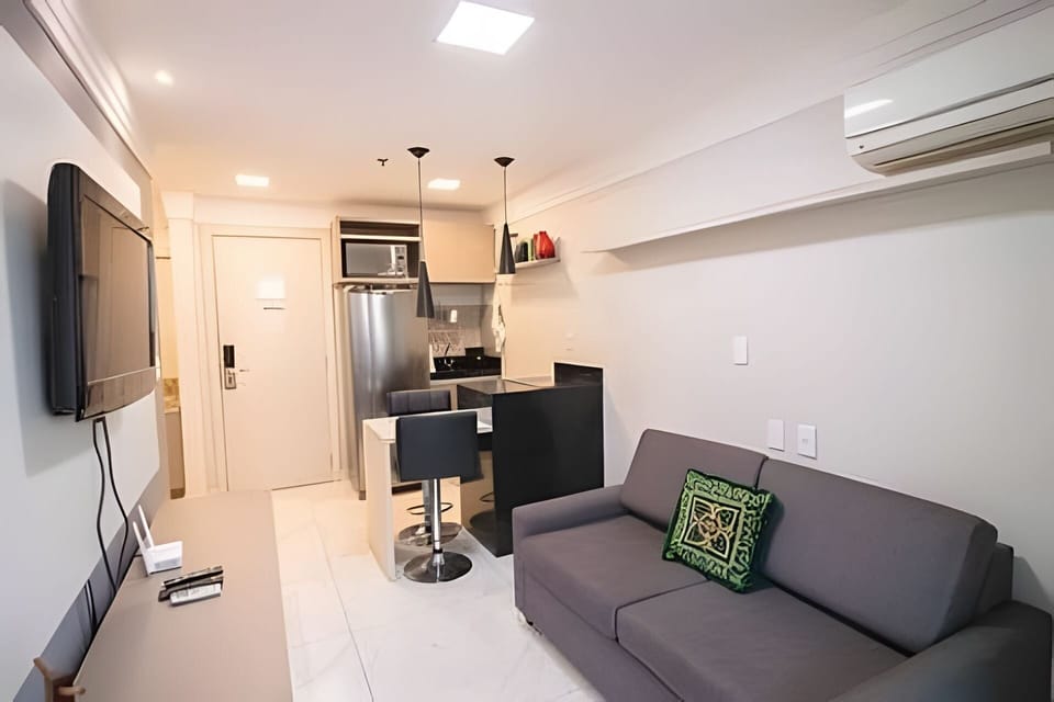 Basic Apartment | Living area | 30-inch TV with cable channels