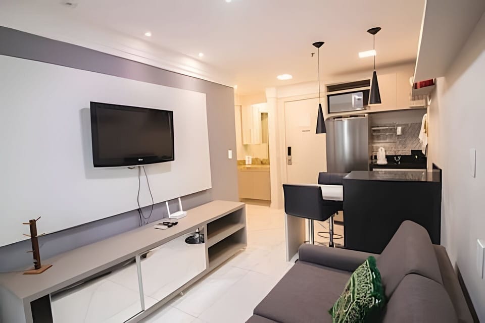 Basic Apartment | Living area | 30-inch TV with cable channels