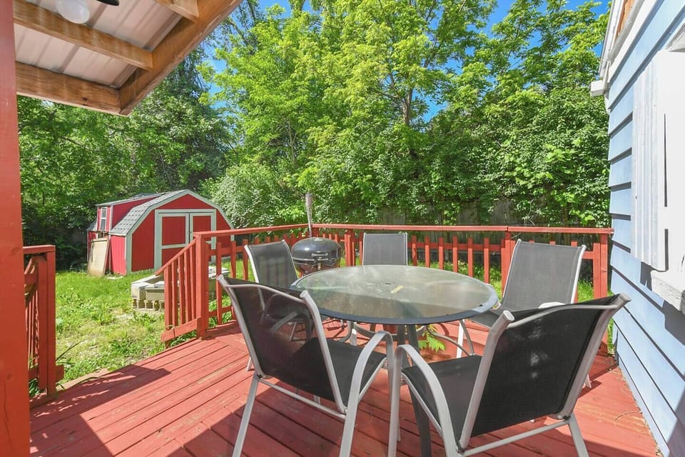 Outdoor dining area and fire pit in the private back yard