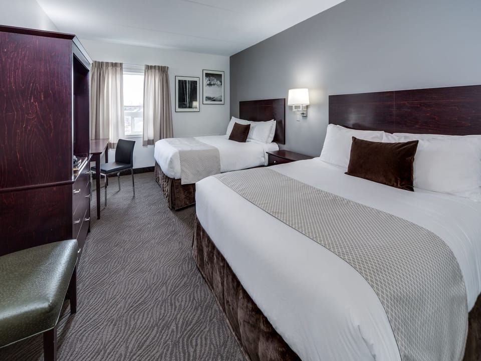 Premier Room, 2 Queen Beds | Desk, blackout drapes, WiFi (free), bed sheets