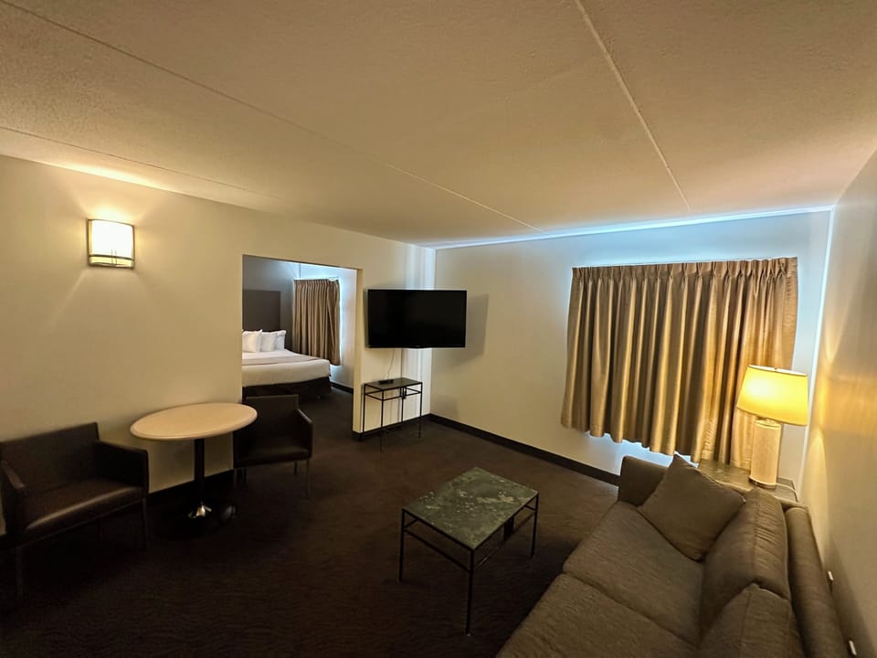 Premier Studio Suite, 2 Queen Beds | Living area | Flat-screen TV