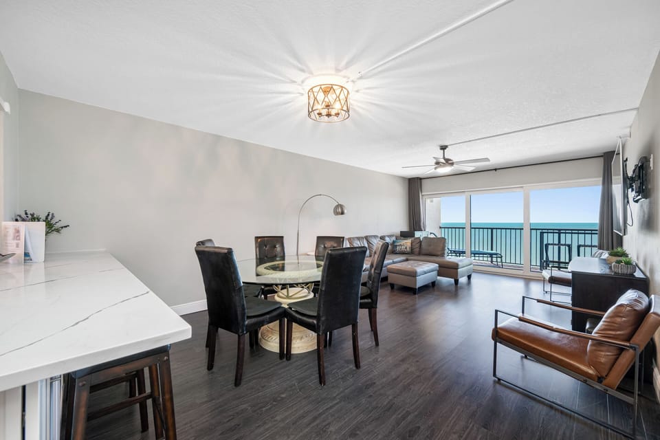 Dining and Living Area with Balcony View