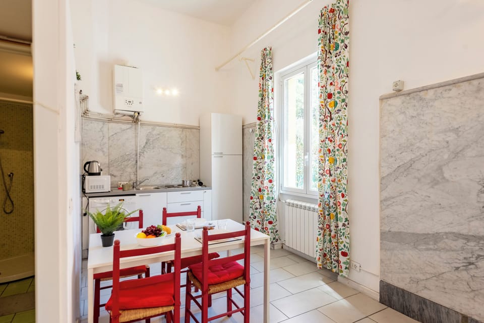 Standard Studio (Apartment Vernazzola In Genova) | Private kitchen | Fridge, microwave, stovetop, electric kettle