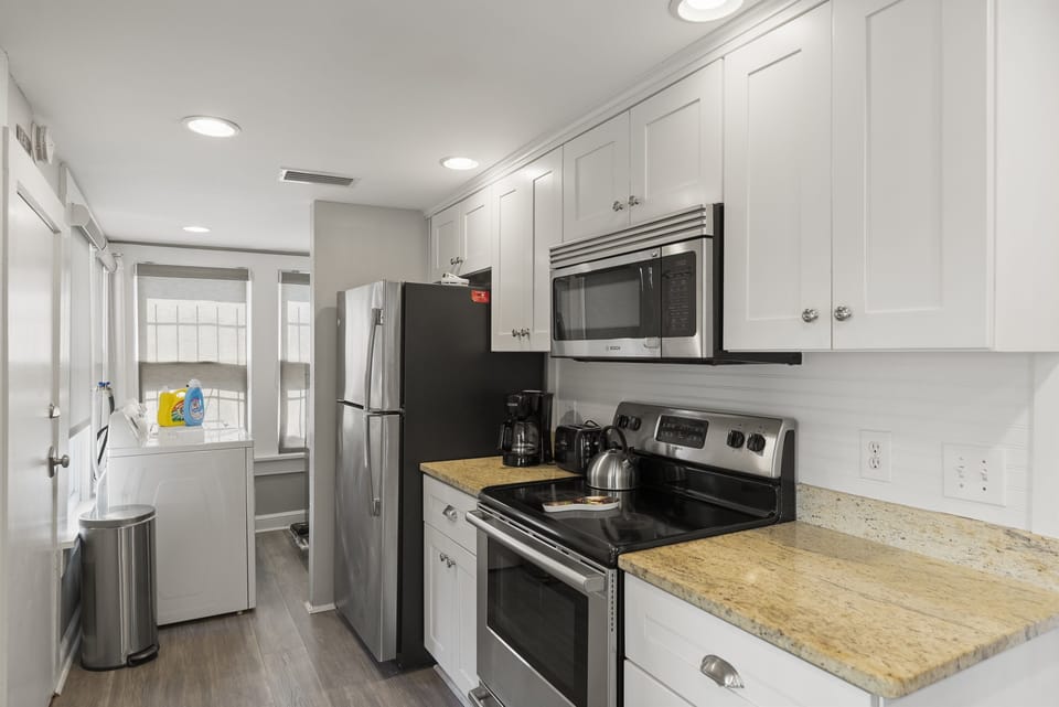 Serve your family with updated kitchen appliances and fully stocked