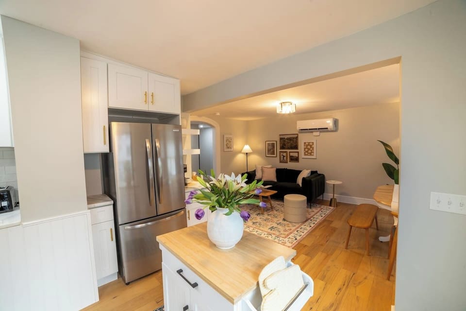 Full size kitchen with double door fridge.