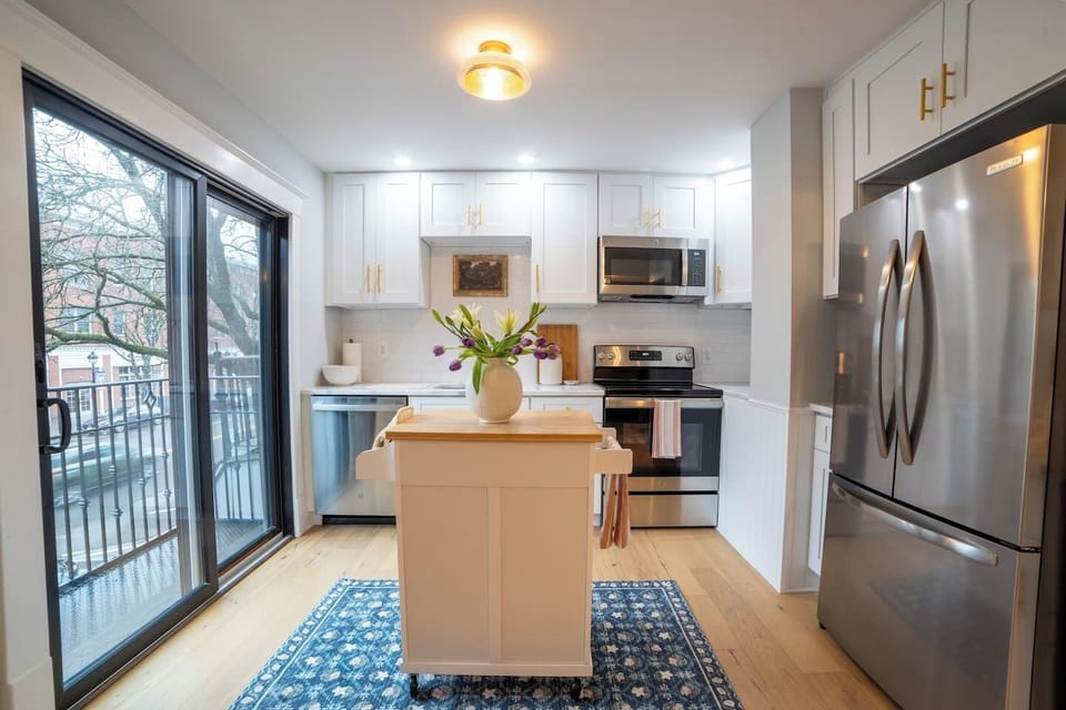 Kitchen has everything you would need to stay in and cook a meal. All new appliances and cookware.