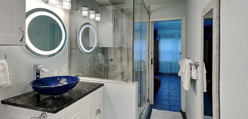 Master Bath- Rain showerhead and wand. Tankless water heater