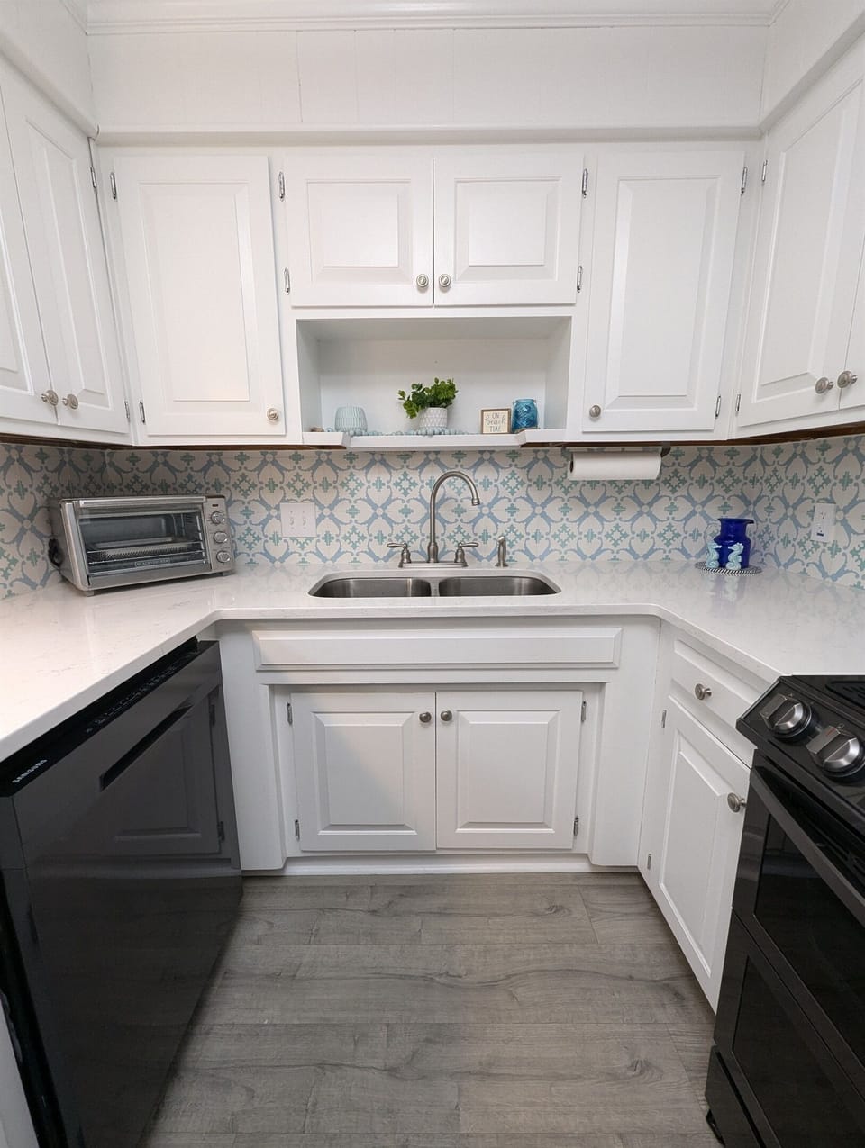 Crisp white cabinets and counters for that clean, coastal feel.
