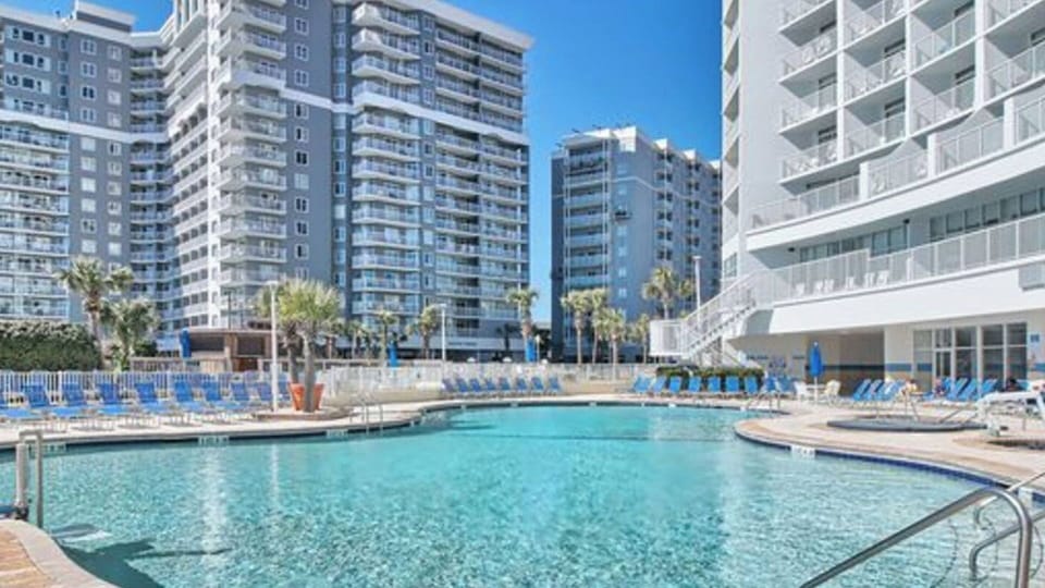 Pool & beach views set the scene for laid-back days in the sun