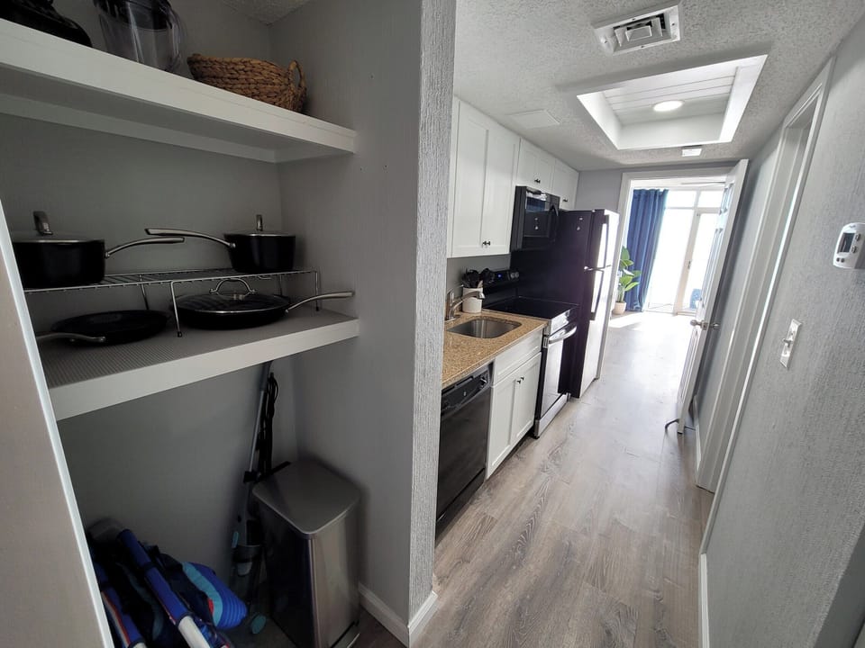 Bright hall space leading into the heart of the condo.