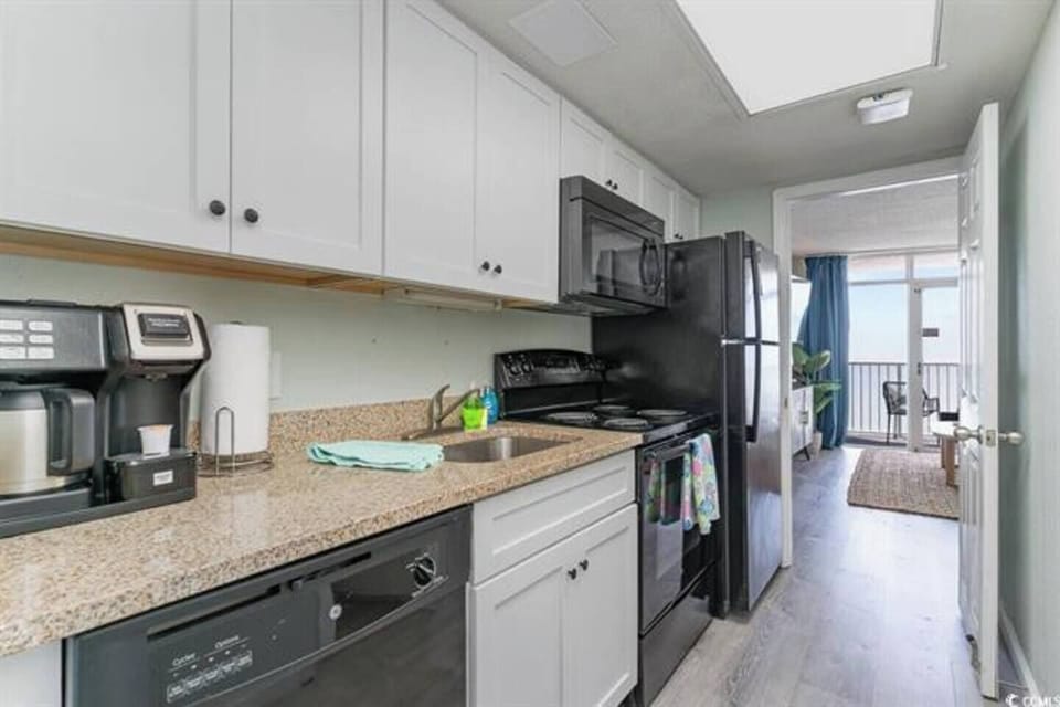 Modern kitchen stocked for easy home-style meals.