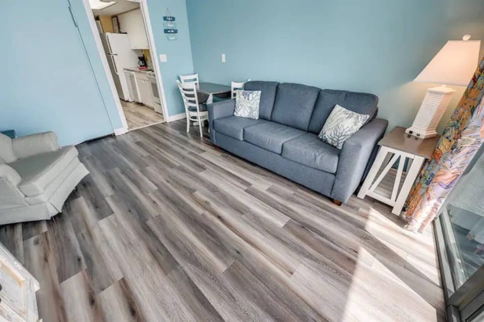 Lounge in the open living room w/ comfy seating