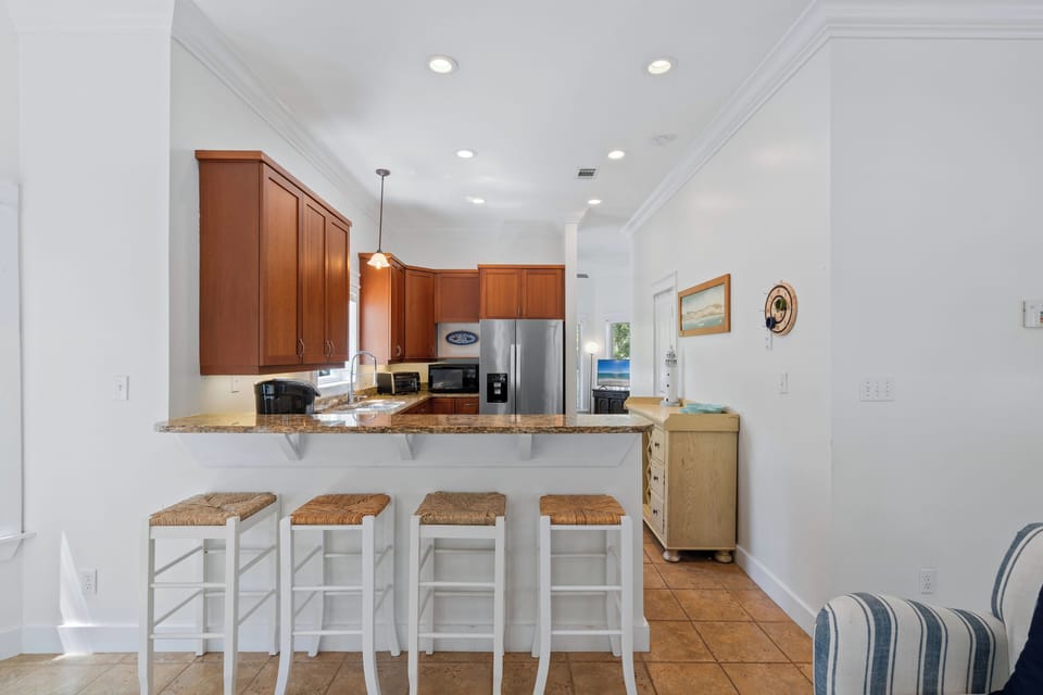 Kitchen with granite at Ocean Glory 30A in Inlet Beach, FL.