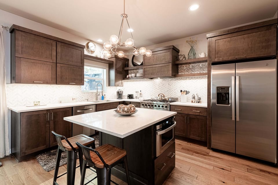 Fully Equipped Modern Kitchen with Island Seating for Two