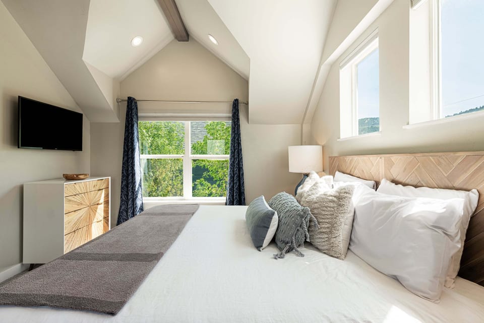 Primary Bedroom 1 - King with Vaulted Ceilings, Private Bathroom, & Sofa Sleeper
