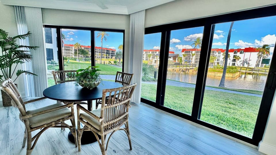 Direct access to the lawn, pool, grills and beach.