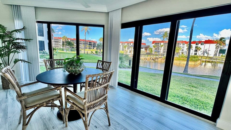 Direct access to the lawn, pool, grills and beach.
