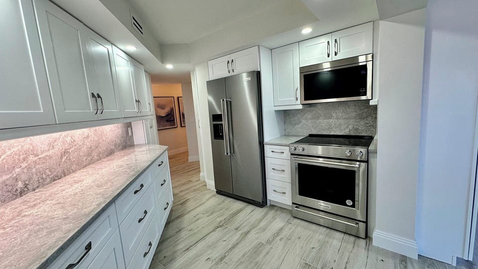 Kitchen Aid appliances, ample storage.