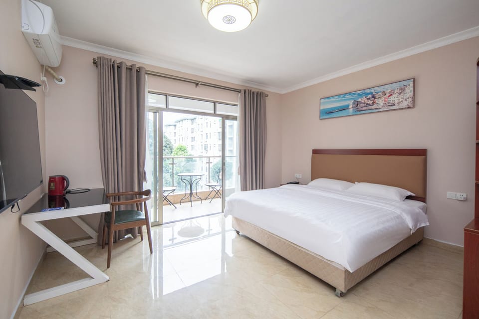 Comfort Twin Room | Egyptian cotton sheets, down comforters, memory foam beds, desk