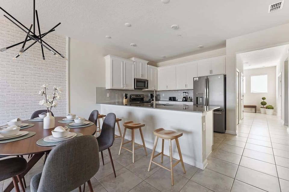 Lovely open-concept dining room and kitchen, perfect for hosting family dinners or having friends over for a happy get-together.