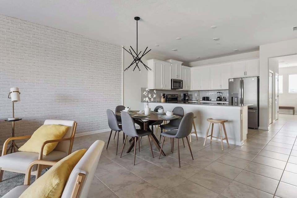 Lovely open-concept dining room and kitchen, perfect for hosting family dinners or having friends over for a happy get-together.