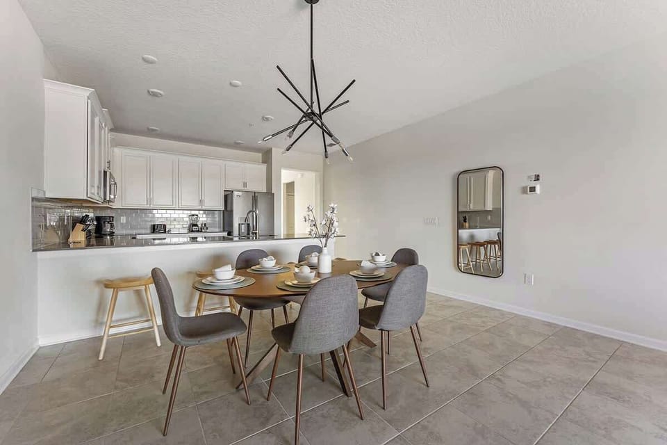 Lovely open-concept dining room and kitchen, perfect for hosting family dinners or having friends over for a happy get-together.