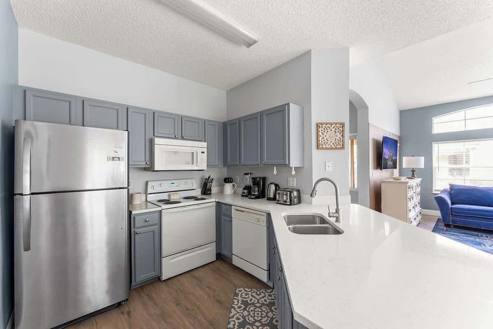 Spacious fully equipped kitchen for an amazing meal preparation.