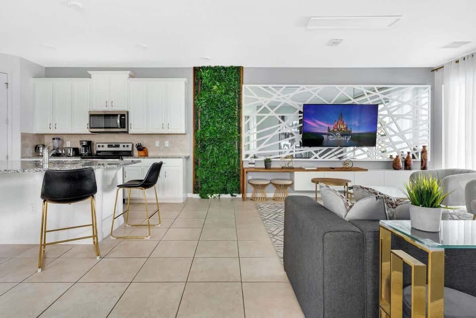 Spacious living room with an open concept and a beautiful view.