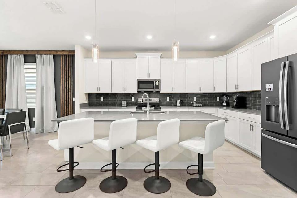 Our completely furnished kitchen includes many small appliances and an open concept so you can enjoy your family while making a delicious meal.