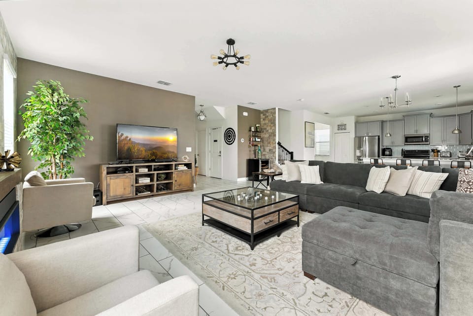 Stupendous and gorgeous family gathering, perfect blend of modern style with a Electric Fireplace emphasize comfort, functionality and practicality. The modern decoration has a sense of sophistication and elegance.