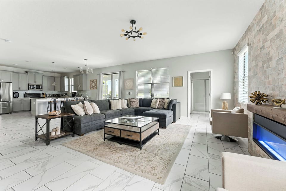 Stupendous and gorgeous family gathering, perfect blend of modern style with a Electric Fireplace emphasize comfort, functionality and practicality. The modern decoration has a sense of sophistication and elegance.