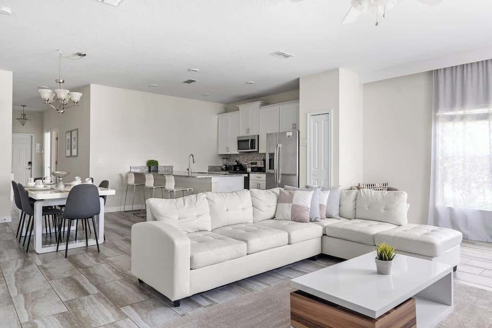 The cozy and inviting living room, designed for ultimate comfort and relaxation. This space features plush sofas and stylish furnishings, perfect for lounging after a day of adventures.
