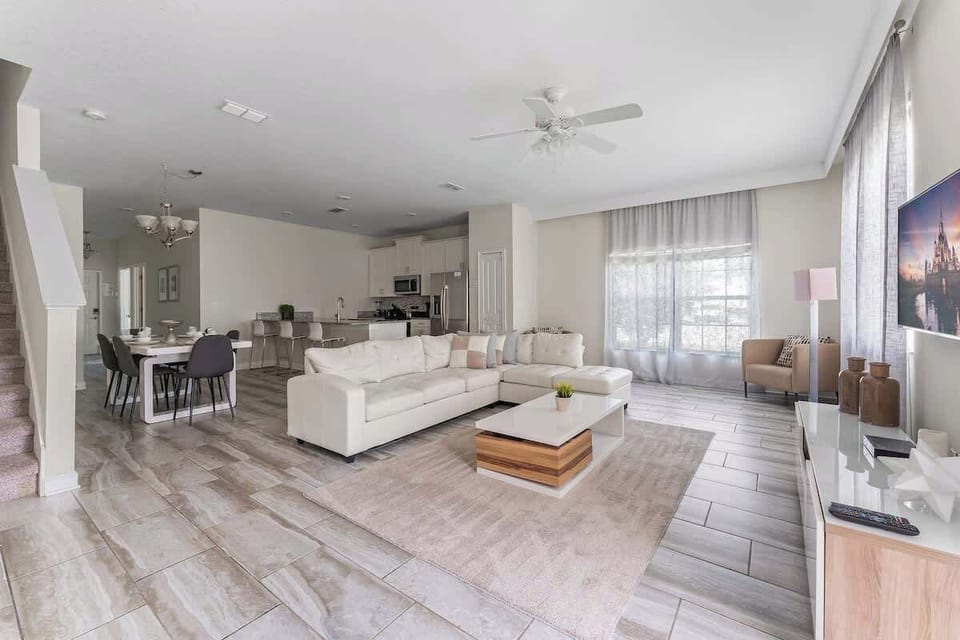 The cozy and inviting living room, designed for ultimate comfort and relaxation. This space features plush sofas and stylish furnishings, perfect for lounging after a day of adventures.
