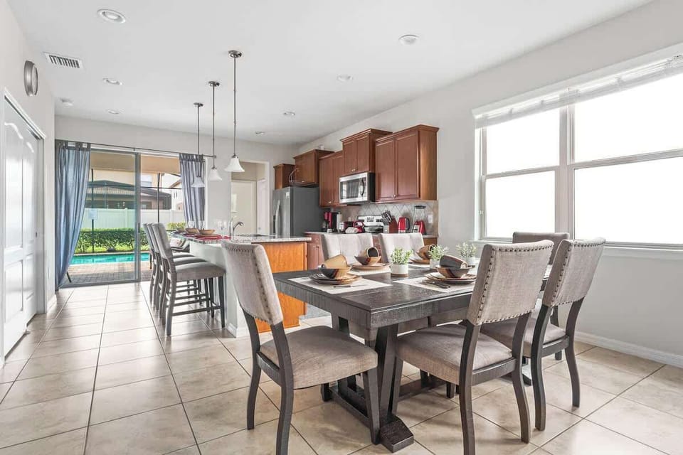 Dining area, well lit and with pool view