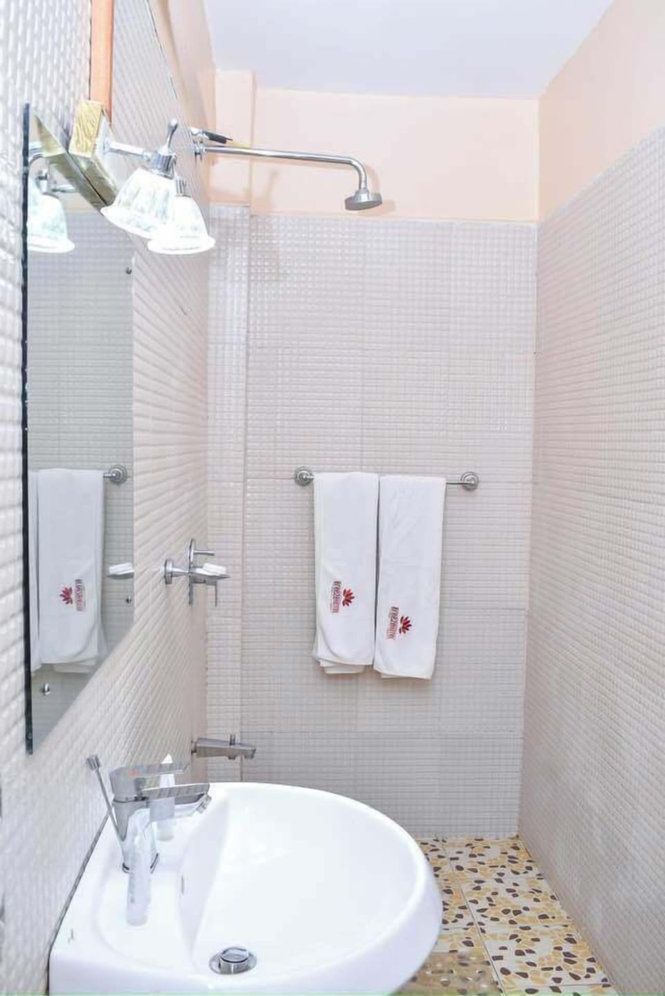 Shower, free toiletries, slippers, towels