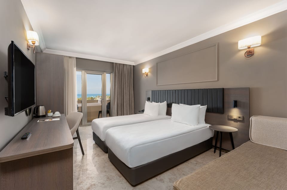SUPERIOR ROOM SEA VIEW | Free minibar items, in-room safe, desk, laptop workspace